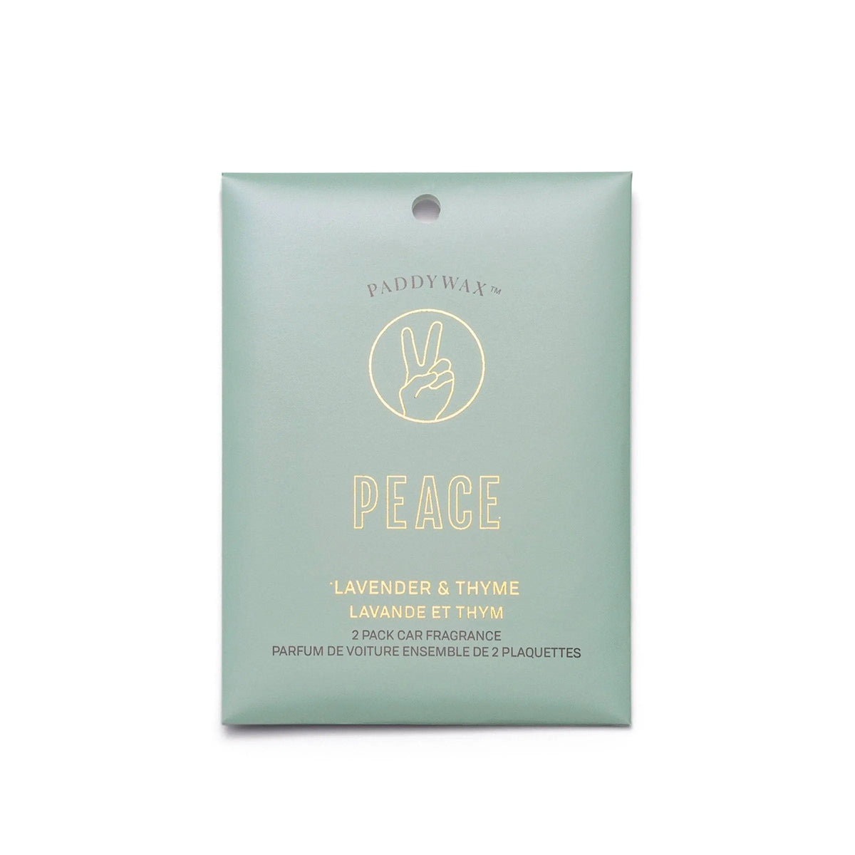 The Lavender + Thyme "Peace" - Impressions Car Fragrance has a green package with a peace sign and contains two refreshing hanging car scents.