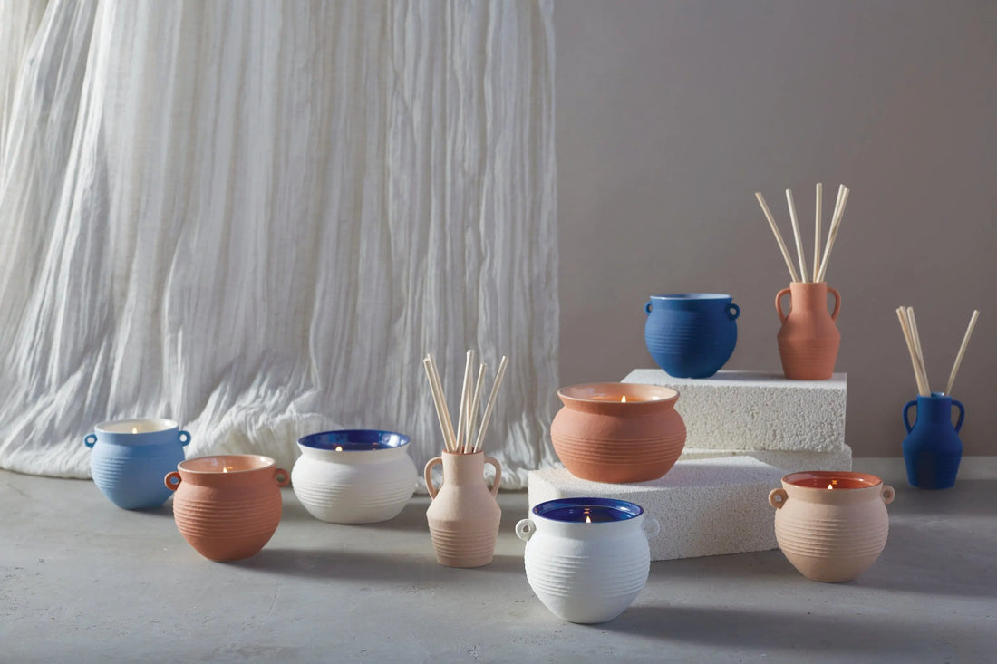 Santorini Collection candles and diffusers romance image against white and cream backdrop