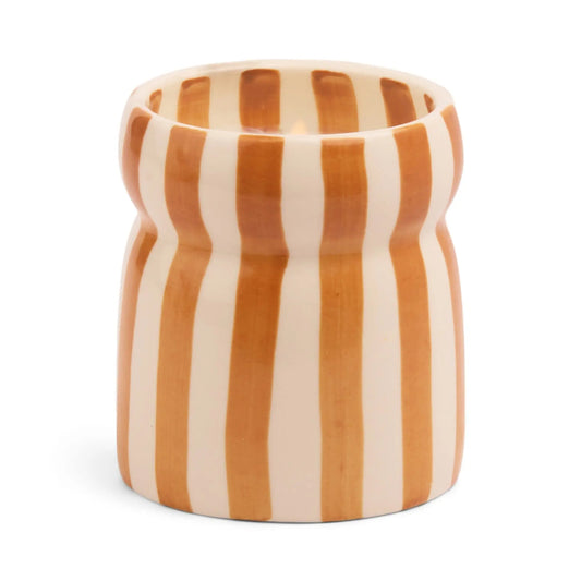 The Sienna Sunset - Cabana 6.5 oz Candle comes in a ceramic vessel with vertical brown and white stripes, a flared rim, and a subtly indented middle—ideal for bringing fresh, coastal-inspired fragrance to your space.