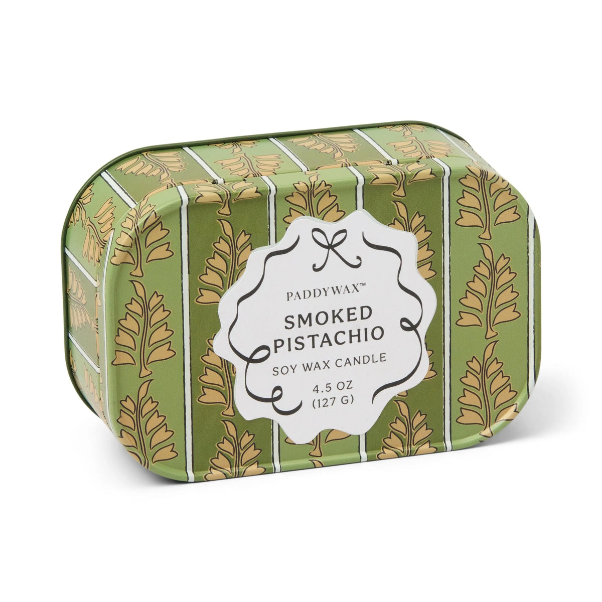 A green tin adorned with gold leaf patterns contains the Smoked Pistachio - Chérie 4.5 oz Tin Candle from Paddywax. Featuring a gourmand-inspired fragrance and crafted from soy wax, this elegant candle comes in a reusable tin, making it a sophisticated addition to any space.