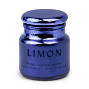 A reflective blue jar labeled "Meyer Lemon - Chroma 2.5 oz Candle" contains a soy wax candle with a Fresh Meyer Lemon scent. Part of the Chroma collection, this electroplated glass candle features a rounded lid and holds 2.5 oz (70g), filling your space with a crisp, Latin-inspired fragrance.