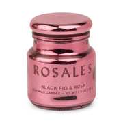 A shiny pink electroplated glass candle jar labeled Saffron Rose with a rounded lid. Part of the Chroma collection candles, the jar contains a soy wax candle and weighs 2.5 oz (70g), capturing a refined, Latin-inspired fragrance.