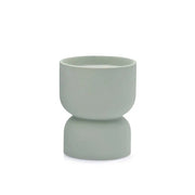 The Ocean Rose & Bay - Form 6 oz Candle features a minimalist, light gray-green ceramic cup with a rounded top and subtly wider base, ideal for home decor. Shown against a white background.