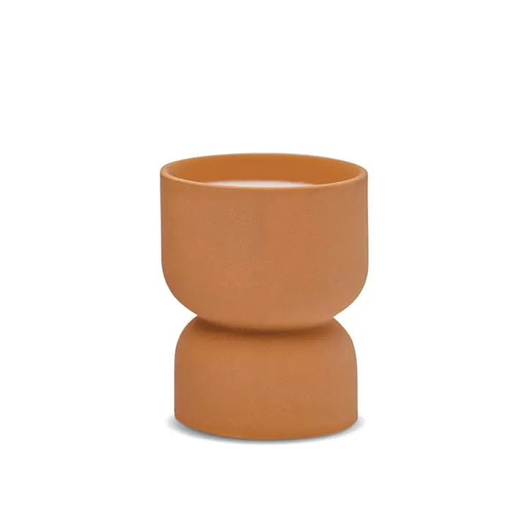 The Wild Fig & Vetiver - Form 6 oz Candle features a small, matte terracotta ceramic cup with a modern double-bowl design—ideal as a planter candle or stylish decorative accent.