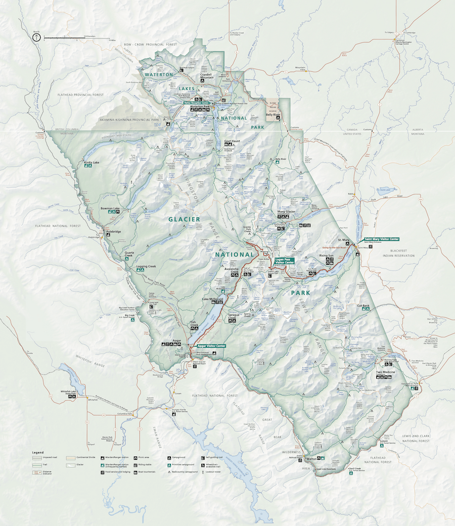 Map of Glacier National Park showing roads, trails, lakes, campgrounds, and visitor centers, with topographic details, park boundaries, and major landmarks such as Lake McDonald, Many Glacier, and Going-to-the-Sun Road.