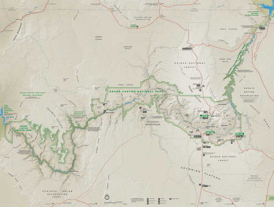 Map showing Grand Canyon National Park, including the North and South Rims, nearby forests and reservations, roads, trails, visitor centers, and key points like the Colorado River, Grand Canyon Village, and entrance stations.