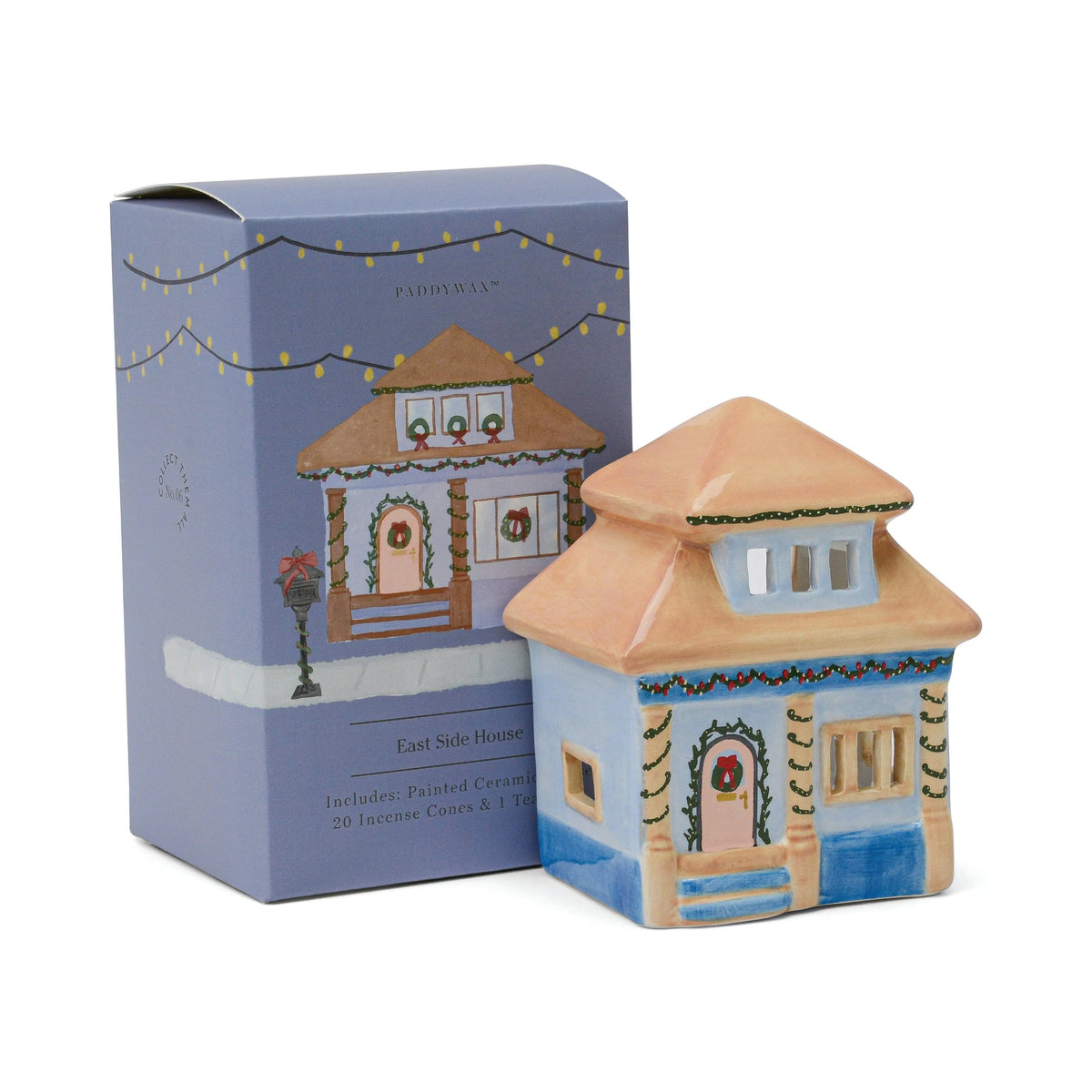 No. 06 The East Side House - Incense & Tea Light Holder features a painted ceramic house holder and comes with a festive box reading: East Side House, Includes: Painted Ceramic House, 20 Incense Cones & 1 Tray.