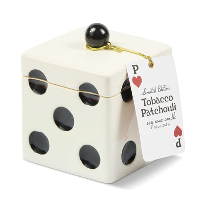 Tobacco Patchouli - Lucky Dice 10 oz candle in an off-white ceramic dice-shaped container with black spots, a black bead on the lid, and a playing card-shaped tag.