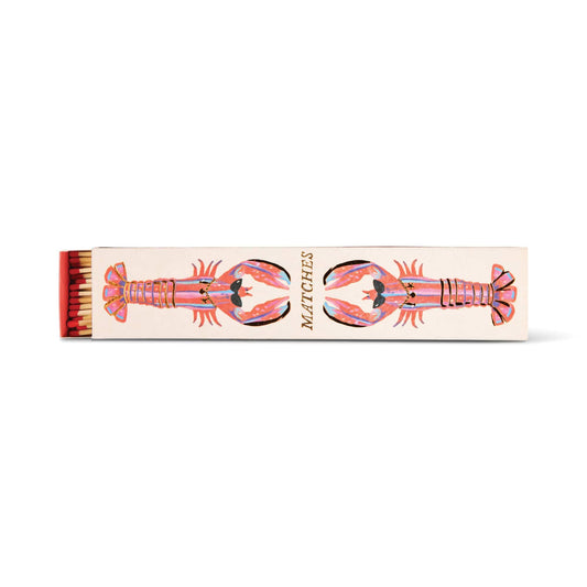 Lobsters - Extra Long Boxed Matches: A rectangular box with two illustrated lobsters facing each other and the word MATCHES between them, containing red-tipped, extra-long safety matches.