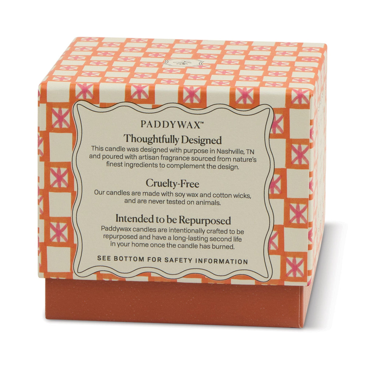 The Cactus Flower - Tulip 5.5 oz Candle comes in a square box with a red and orange geometric pattern, cream label, and is thoughtfully designed, cruelty-free, and meant to be repurposed—ideal for home decor.