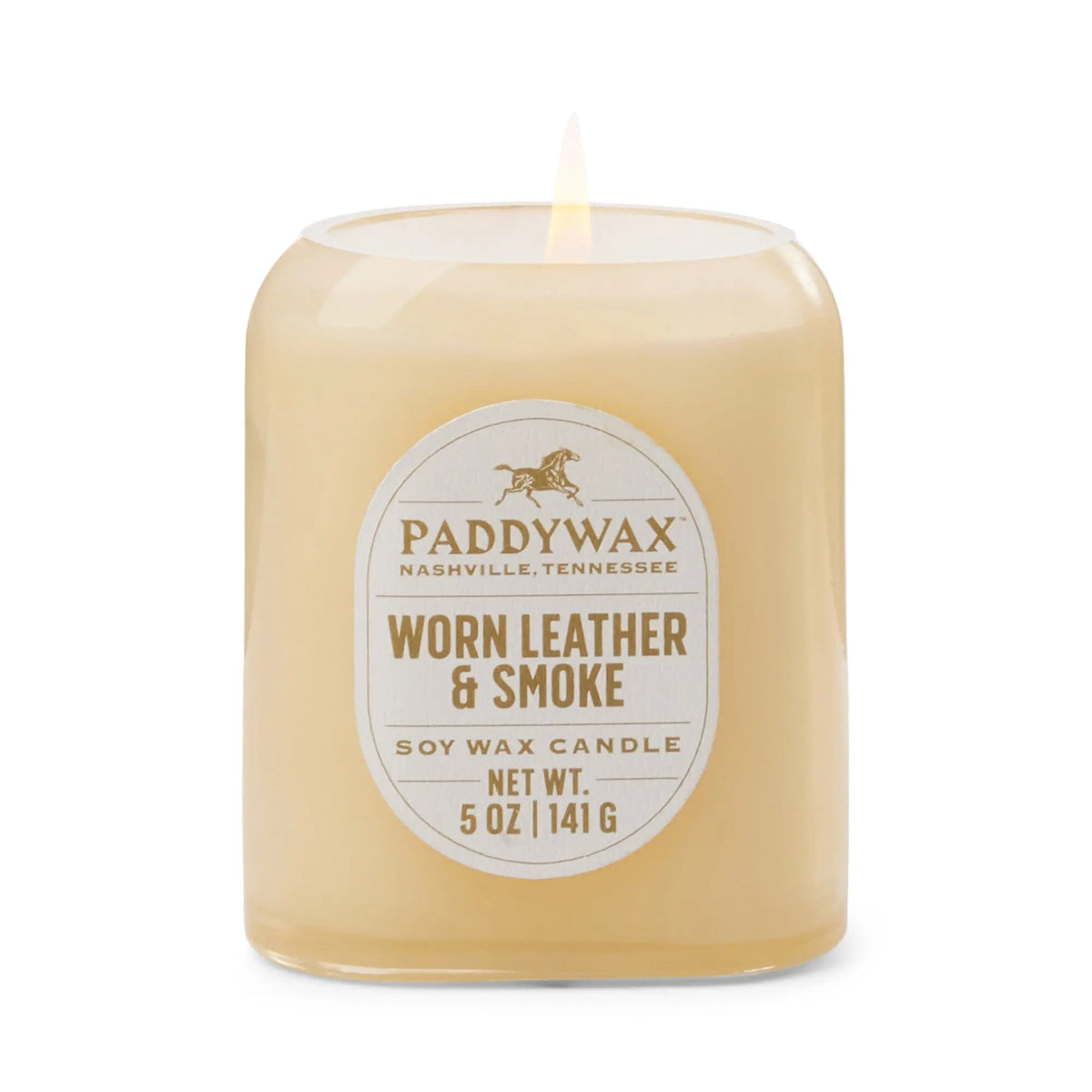 The Worn Leather & Smoke - Vista 5 oz Candle infuses any modern home decor with a luxurious fragrance, presented in a stylish beige glass jar labeled Paddywax Nashville, Tennessee.