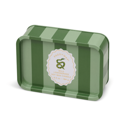 A green rectangular tin candle with vertical stripes and a coiled snake label reading "Wild Lemongrass - A Dopo 6.5 oz Tin Candle"; perfect as a summer scent or repurposed as a stylish multi-use tray.