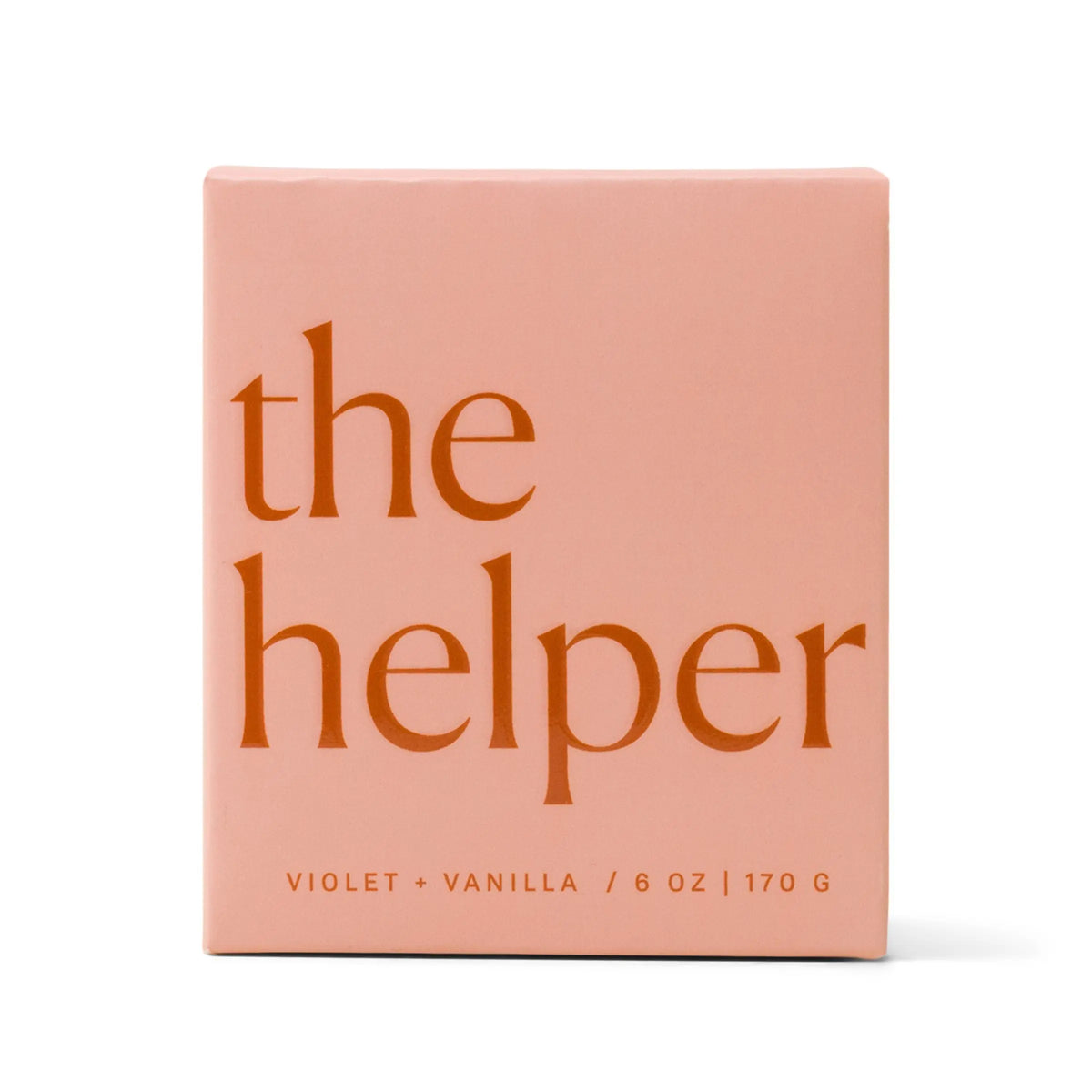 A pink box labeled "Enneagram #2 Helper" in large orange letters, with violet + vanilla and 5 oz / 142 g written in smaller text at the bottom, captures the distinctive charm of Enneagram candles and would make a thoughtful addition to any fragrance gift set.
