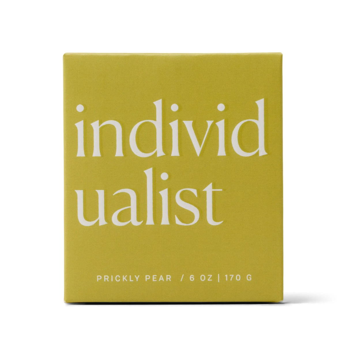 A square, olive-green box with "individualist" in large white letters and "PRICKLY PEAR / 5 OZ" in smaller text at the bottom, this packaging hints at the distinctive Enneagram #4 Individualist Candle inside—a unique prickly pear fragrance gift designed for self-expression.
