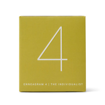 A yellow square box with a large white number 4 and the text “ENNEAGRAM 4 | THE INDIVIDUALIST” at the bottom, designed to hold the Enneagram #4 Individualist 5 oz Candle in Prickly Pear—a perfect fragrance gift set for celebrating individuality.