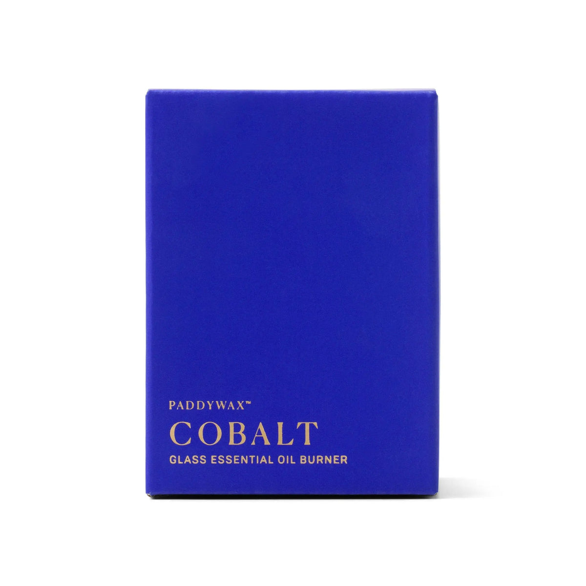 A cobalt blue rectangular box with gold text reads "Cobalt Blue Glass - Essential Oil Burner & Tea Light Candle" on the front, perfect for aromatherapy. The box stands upright against a white background.