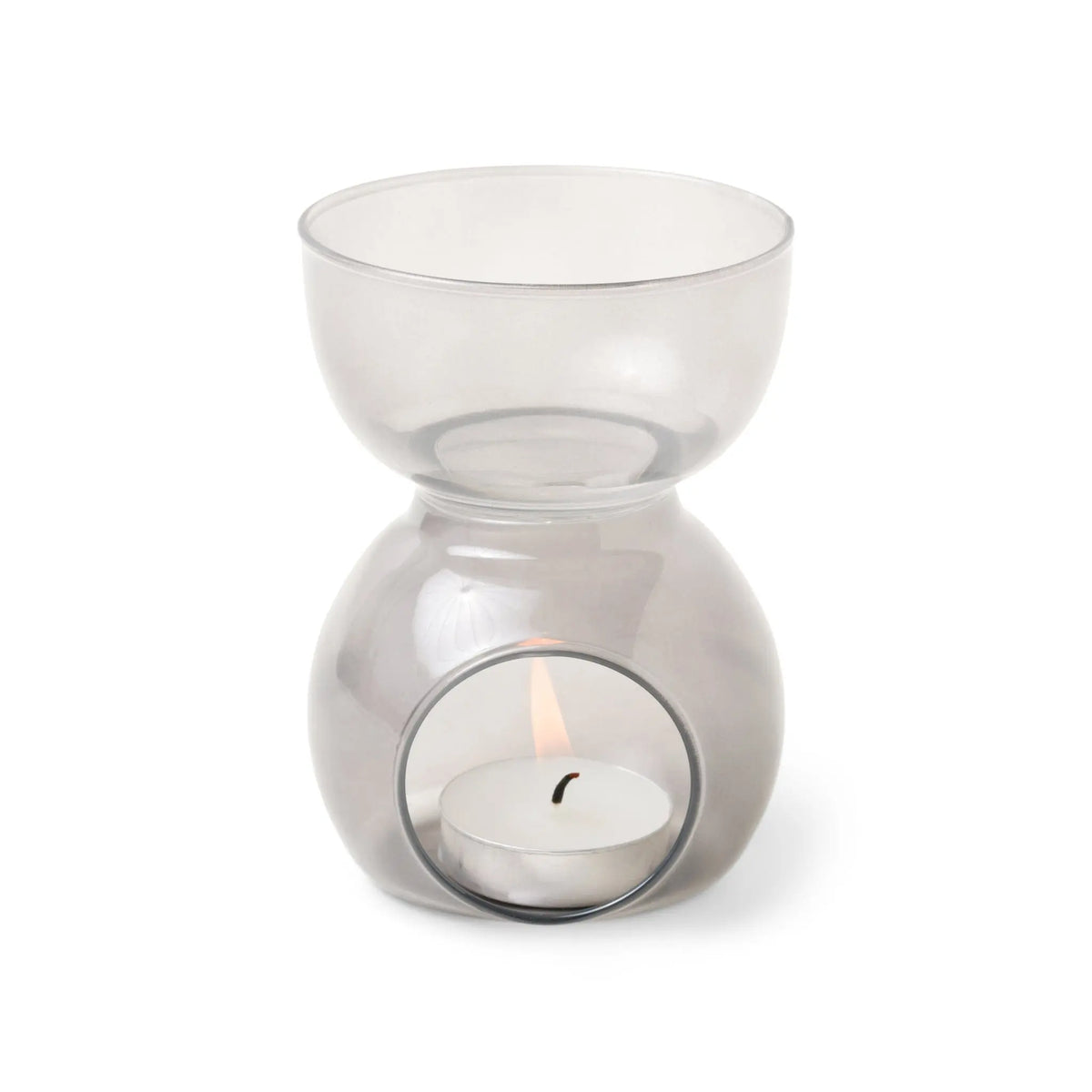 Introducing the Black Glass - Essential Oil Burner & Tea Light Candle, a stylish oil burner made from elegant black glass with a round bowl on top and a tea light candle gently illuminating its base compartment.