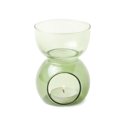 The Sage Green Glass - Essential Oil Burner & Tea Light Candle features a round base, open front, and top bowl for oils or wax melts—ideal for aromatherapy and relaxing moods.