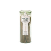 The Wild Mint + Santal - Haze Incense comes in a glass jar with 100 sticks. The scent is displayed on the front label, making it a perfect flameless fragrance for any space and a great addition to your incense collection.