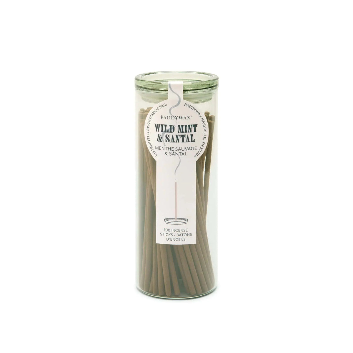 The Wild Mint + Santal - Haze Incense comes in a glass jar with 100 sticks. The scent is displayed on the front label, making it a perfect flameless fragrance for any space and a great addition to your incense collection.