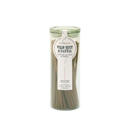 The Wild Mint + Santal - Haze Incense comes in a glass jar with 100 sticks. The scent is displayed on the front label, making it a perfect flameless fragrance for any space and a great addition to your incense collection.