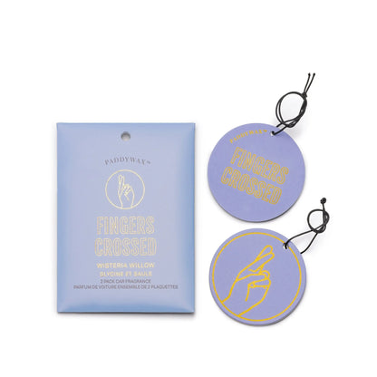 The Wisteria + Willow “Fingers Crossed” Impressions Car Fragrance set includes two round lavender hanging fresheners with a yellow fingers-crossed graphic, delivering uplifting scent for your car.