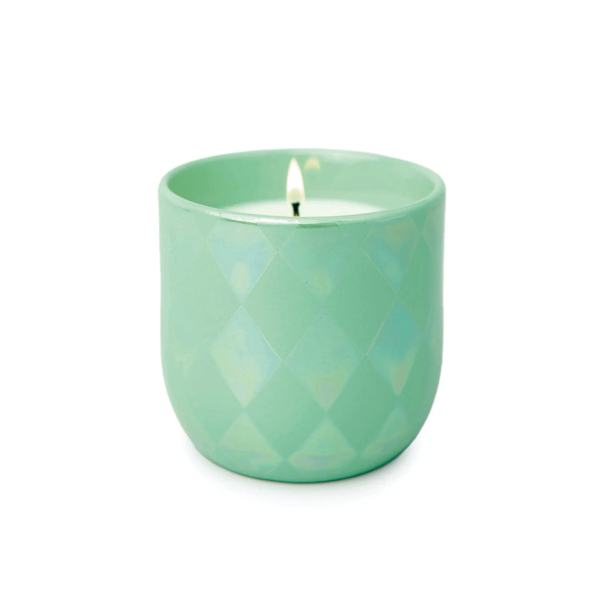 The Matcha & Mint - Lustre Candle 10 oz features a glowing white candle in a light green, quilted ceramic vessel, capturing the fresh scent of matcha and mint, displayed on a plain white background.