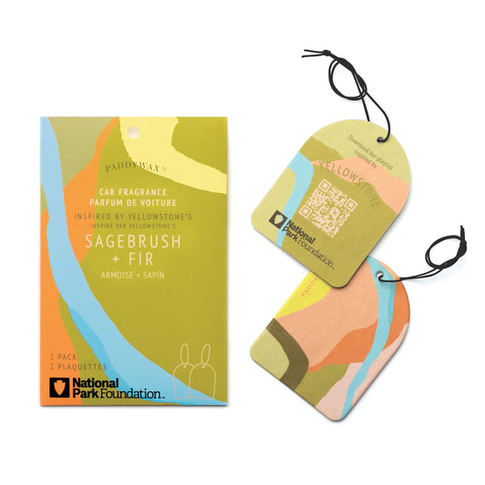 A package of Yellowstone - Parks Car Fragrance and two abstract air fresheners in green, blue, tan, and orange, inspired by Yellowstone National Park and featuring the National Park Foundation logo.