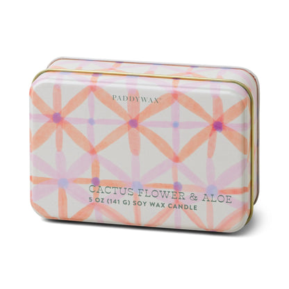 Cactus Flower & Aloe - 5 oz Tin Candle: A rectangular tin candle with a pink and orange geometric floral pattern, offering a fresh floral scent.
