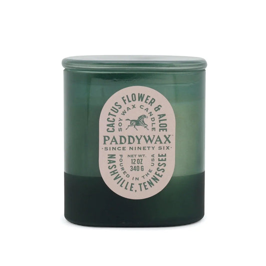 A 12oz (340g) green glass jar candle from the Vista collection, labeled "Cactus Flower + Aloe," made with soy wax and poured in Nashville, Tennessee.