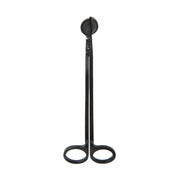 The Wick Trimmer - Matte Black features scissor-like handles and a circular cutting tip, enabling safe, efficient trimming of candle wicks.